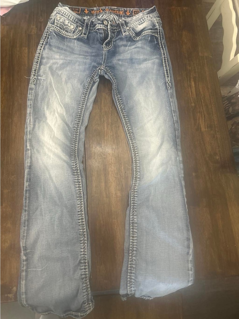 Rock Revival Womenโs Light Blue Flare Jeans